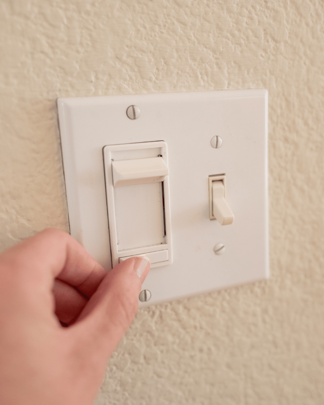 PH Electric is installing a modern dimmer switch in a Fort Collins, CO home.